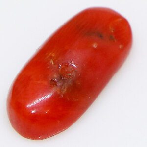 3-carat Coral gemstone with smooth polish.