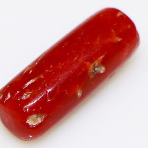 Close-up of Vibrant Red Coral Loose Gemstone