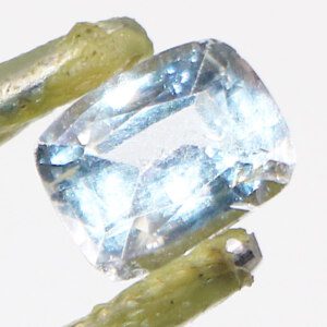 Genuine white topaz gemstone with Tweezer