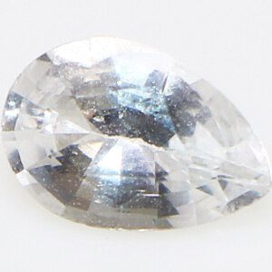 White Topaz for Venus gemstone held by tweezers