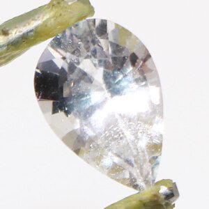 Genuine natural white topaz loose gemstone with tweezers