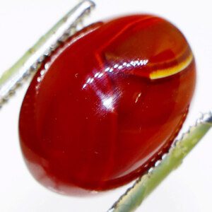 Close-up of Royale Agate Gemstone with Tweezers