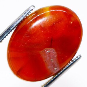 Macro shot of an Agate gemstone showcasing its intricate details and fascinating patterns.