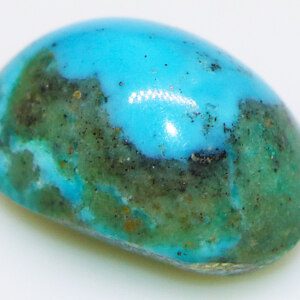 Original Feroza stone, showcasing its vibrant blue color