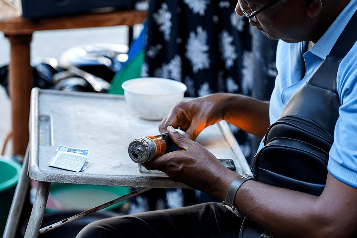 Inspecting a gemstone using a Rathnapura gem torch